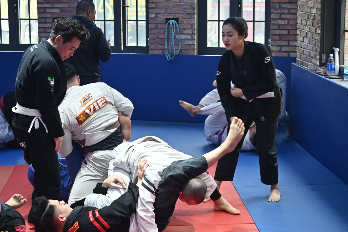 C88 x DP students rolling on the mats