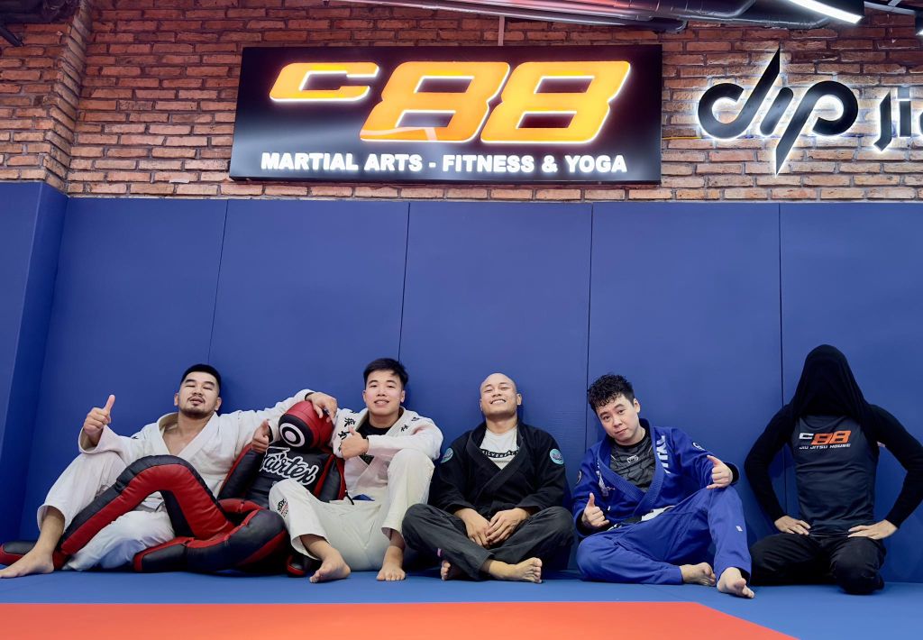 Community posing after open mat